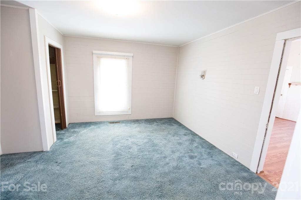 200 Hiddenite Church Road Hiddenite, NC 28636 - Photo 18 of 20 an empty room with windows