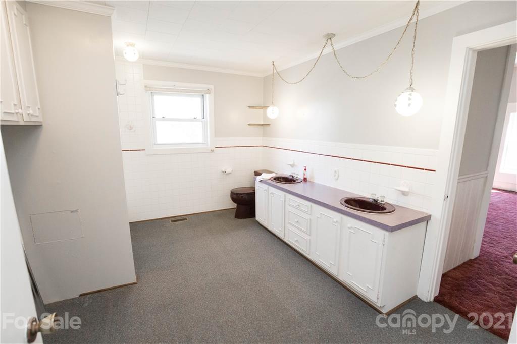 200 Hiddenite Church Road Hiddenite, NC 28636 - Photo 20 of 20 a utility room with washer and dryer