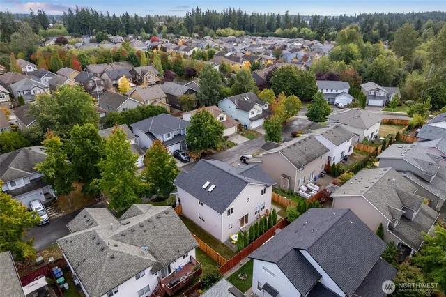 an aerial view of a house with outdoor space