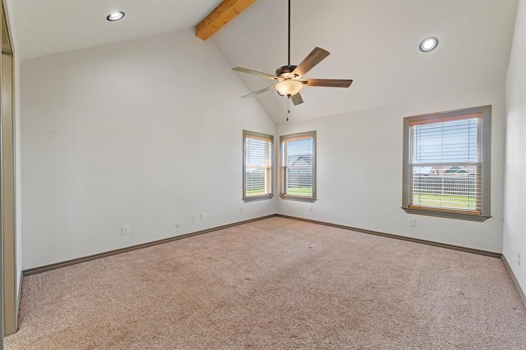 2387 County Road 407 Nemo, TX 76070 - Photo 12 of 30 an empty room with windows and fan