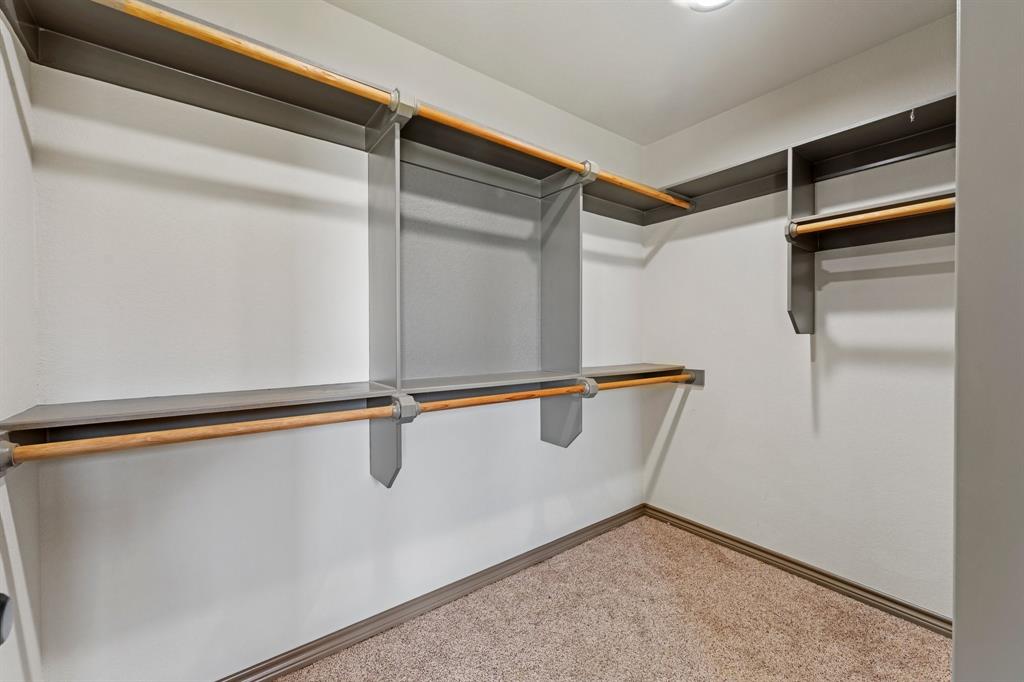 2387 County Road 407 Nemo, TX 76070 - Photo 17 of 30 a view of a room with rack on the wall