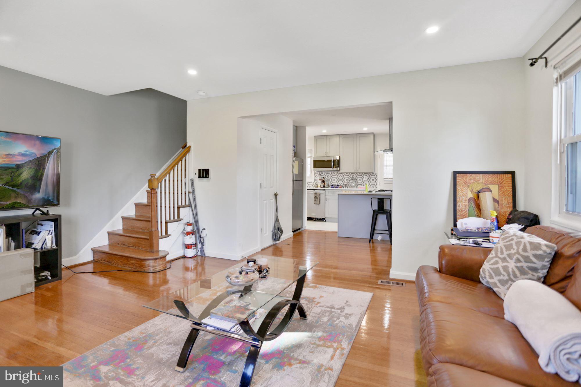 4910 Sargent Road Northeast Washington, DC 20017 - Photo 7 of 16 a living room with furniture and wooden floor