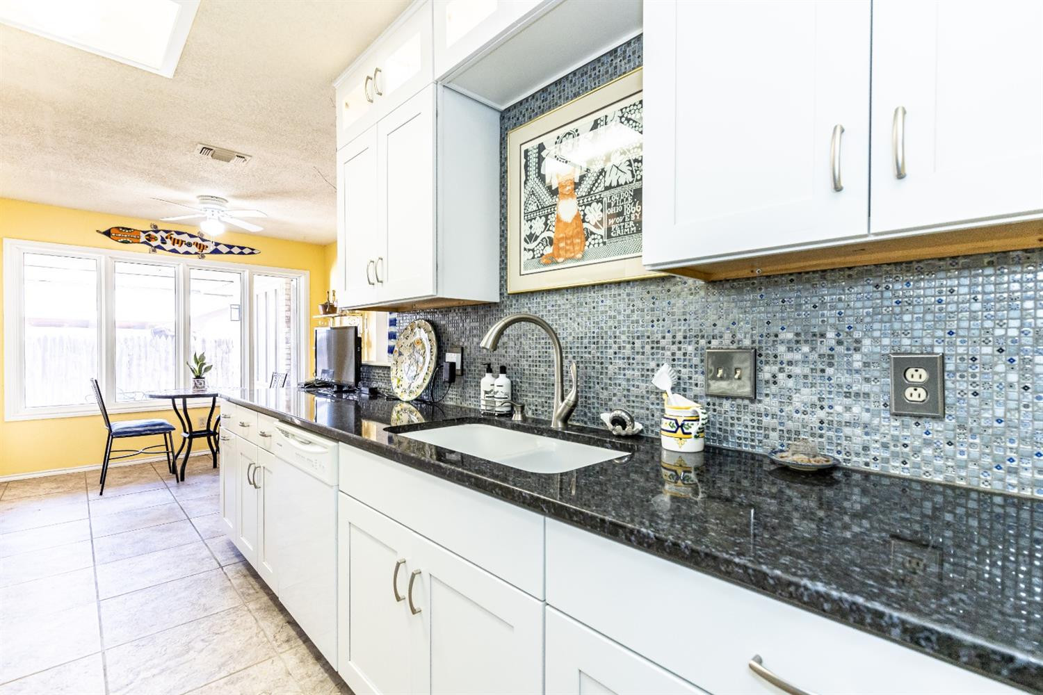 5221 84th Street Lubbock, TX 79424 - Photo 18 of 42 a close view of sink and mirror