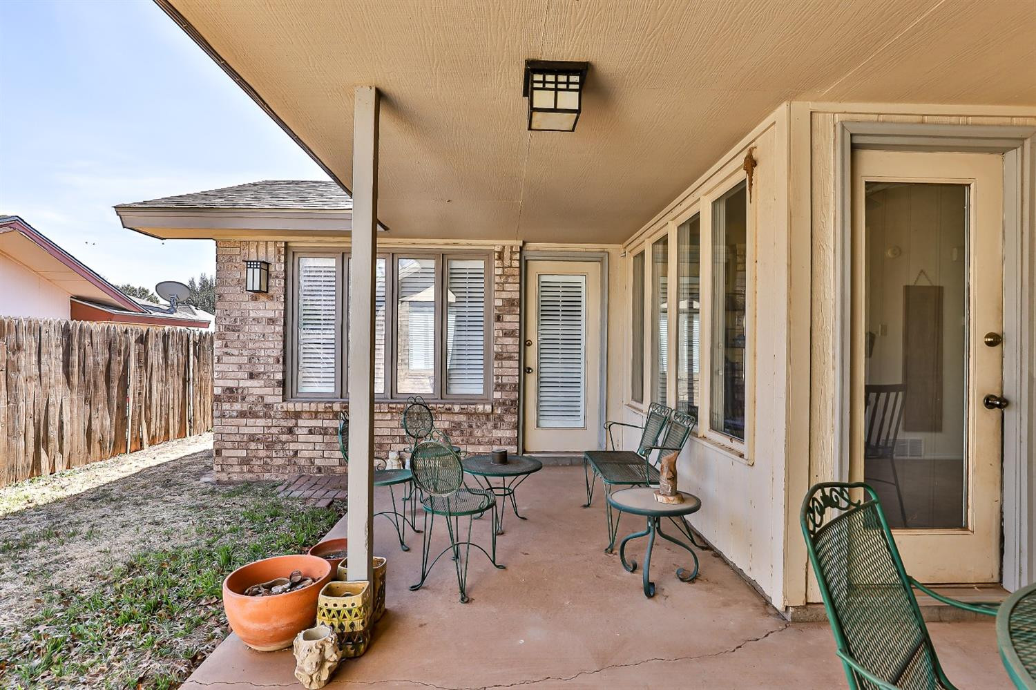 5221 84th Street Lubbock, TX 79424 - Photo 37 of 42 a living room with furniture and a large window