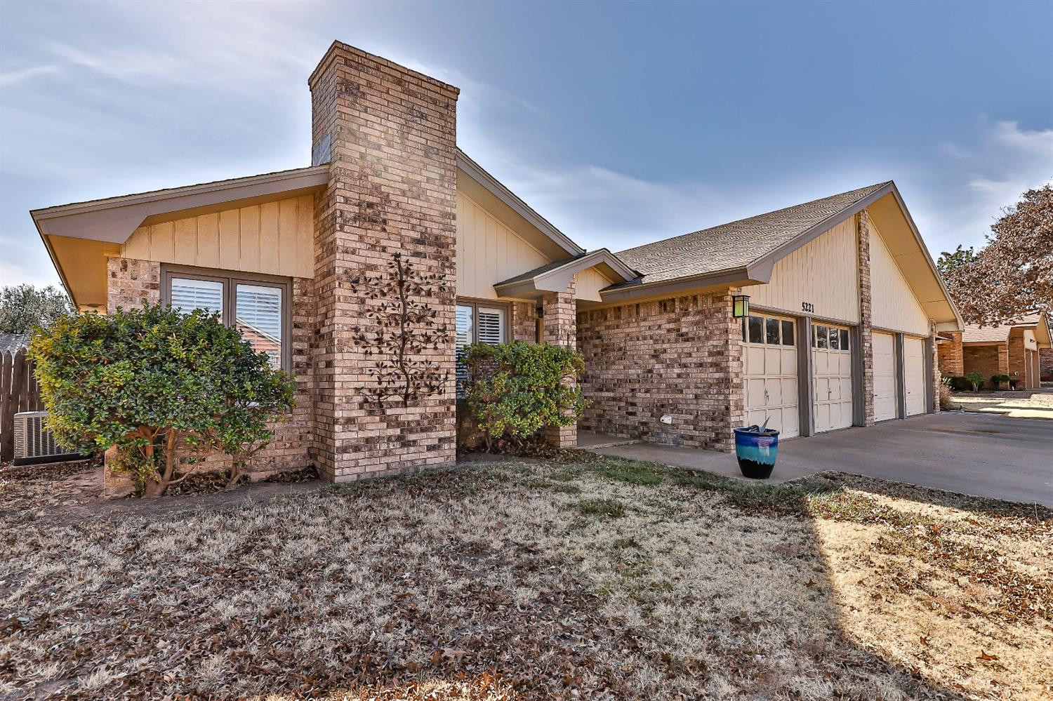 5221 84th Street Lubbock, TX 79424 - Photo 42 of 42 a view of a backyard with plants