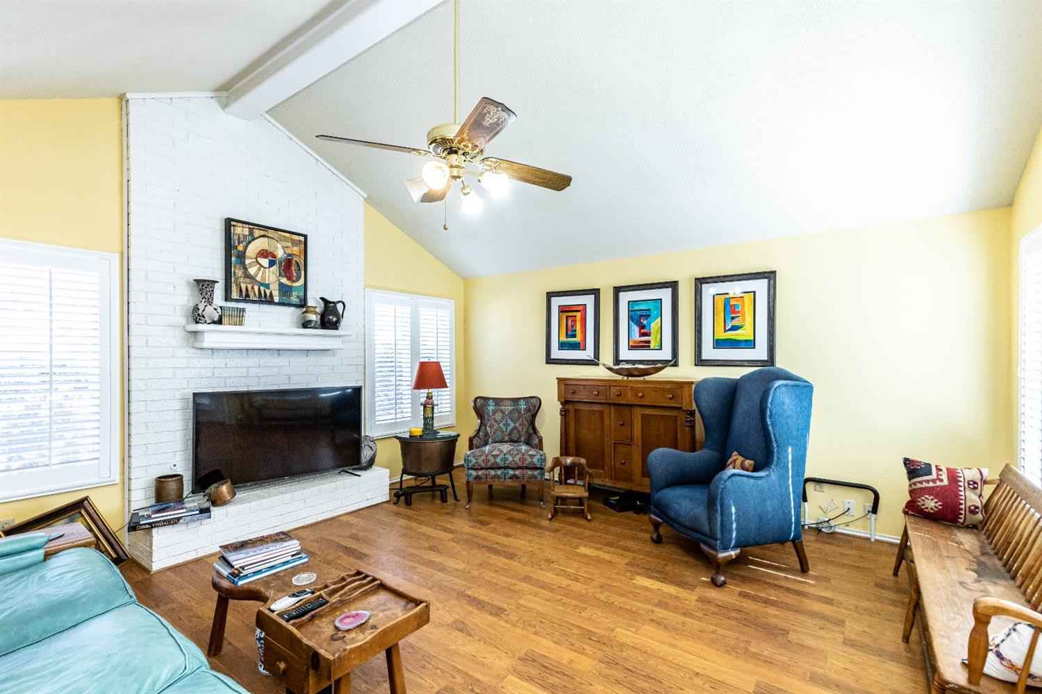 5221 84th Street Lubbock, TX 79424 - Photo 6 of 42 a living room with furniture and a fireplace