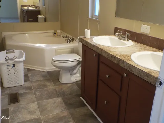 a view of a house with a back yard