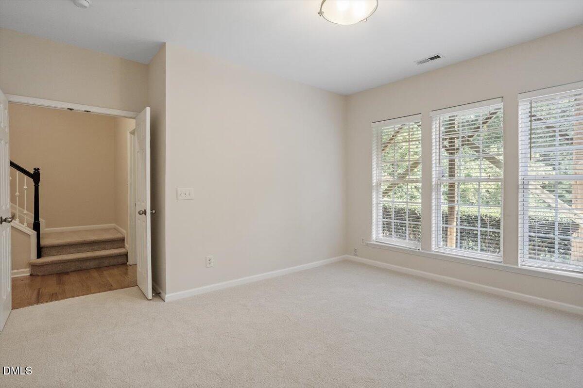 2746 Laurel Cherry Street Raleigh, NC 27612 - Photo 15 of 23 a view of an empty room with a window
