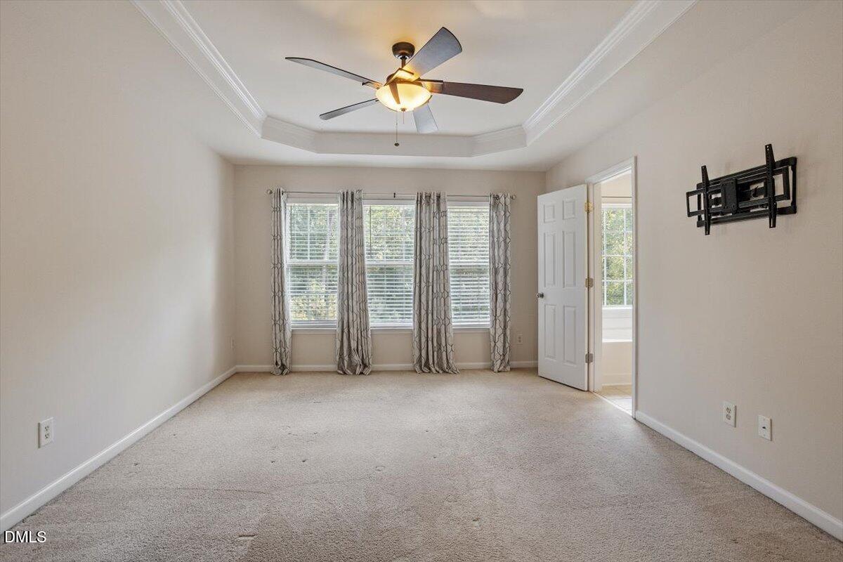 2746 Laurel Cherry Street Raleigh, NC 27612 - Photo 16 of 23 wooden floor in an empty room with a window