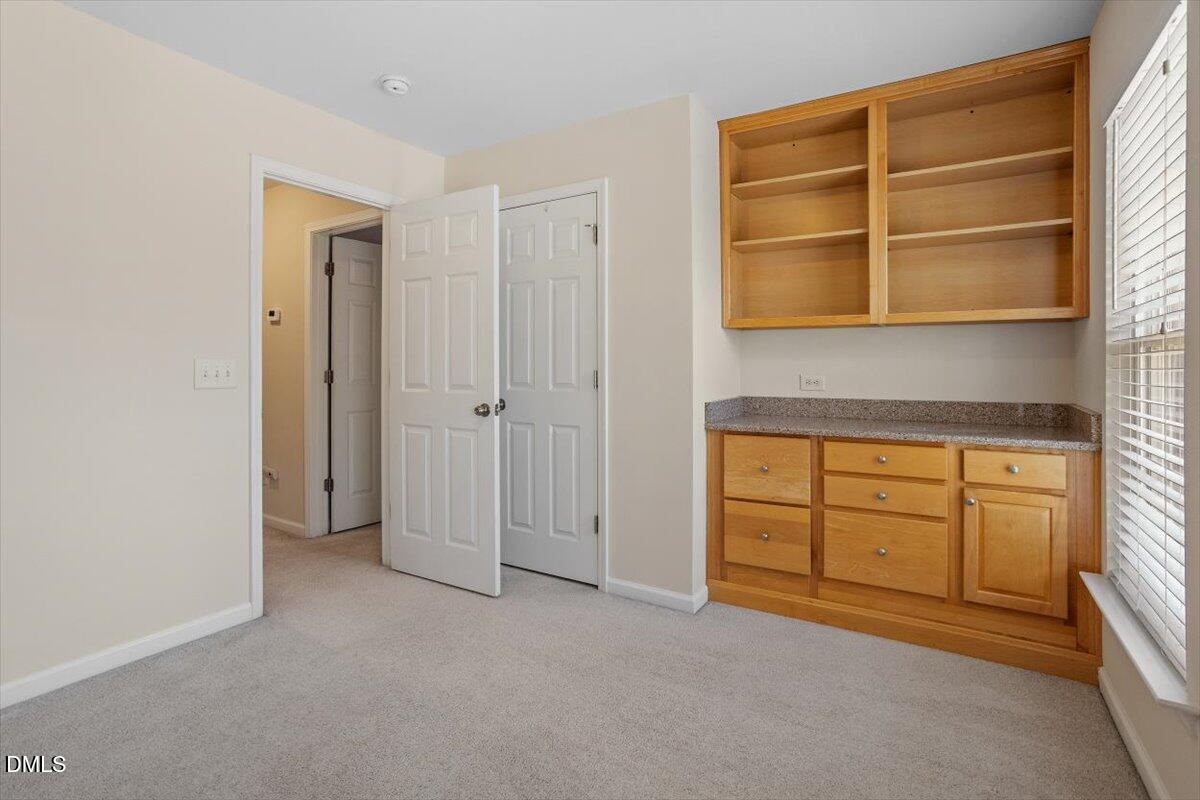 2746 Laurel Cherry Street Raleigh, NC 27612 - Photo 22 of 23 a view of an empty room with a window