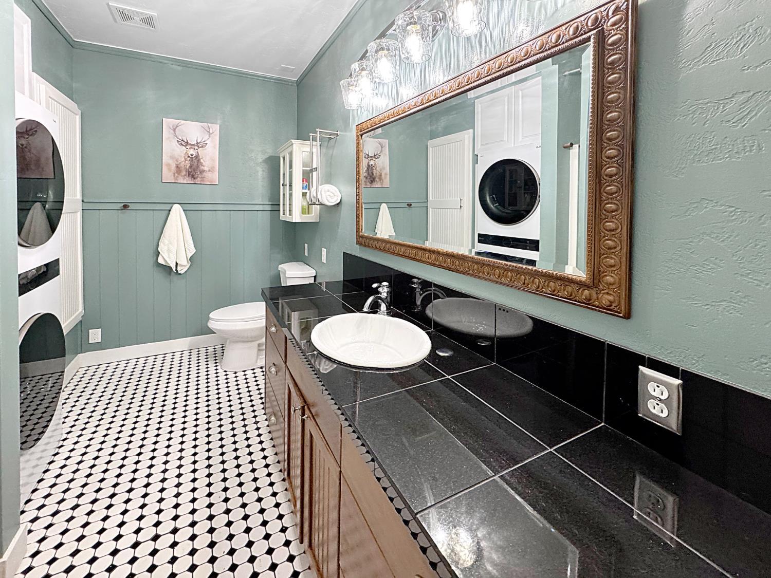 16878 Pasquale Road Nevada City, CA 95959 - Photo 25 of 36 a bathroom with a sink and a mirror
