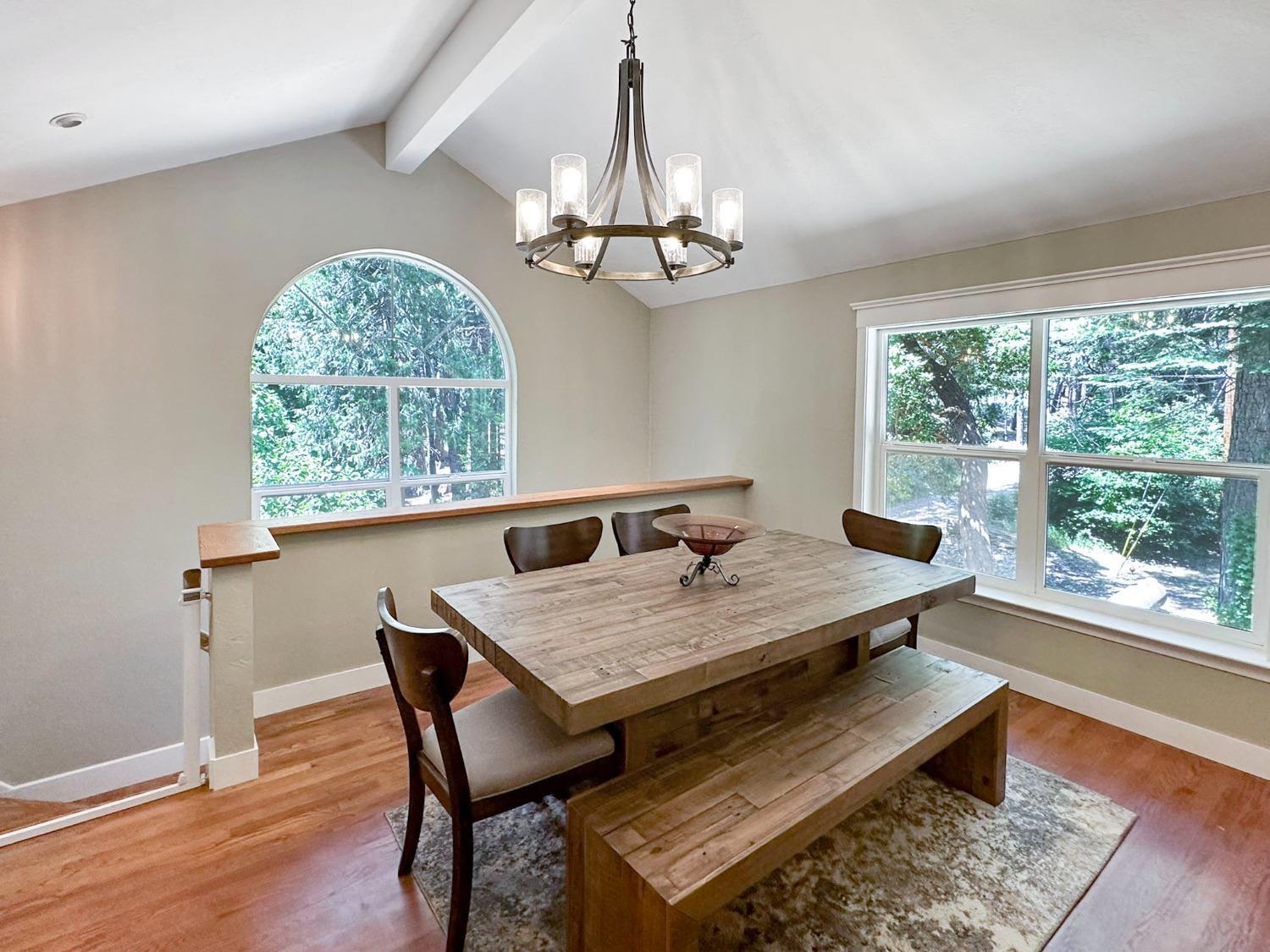 16878 Pasquale Road Nevada City, CA 95959 - Photo 6 of 36 a view of a dining room with furniture window and wooden floor