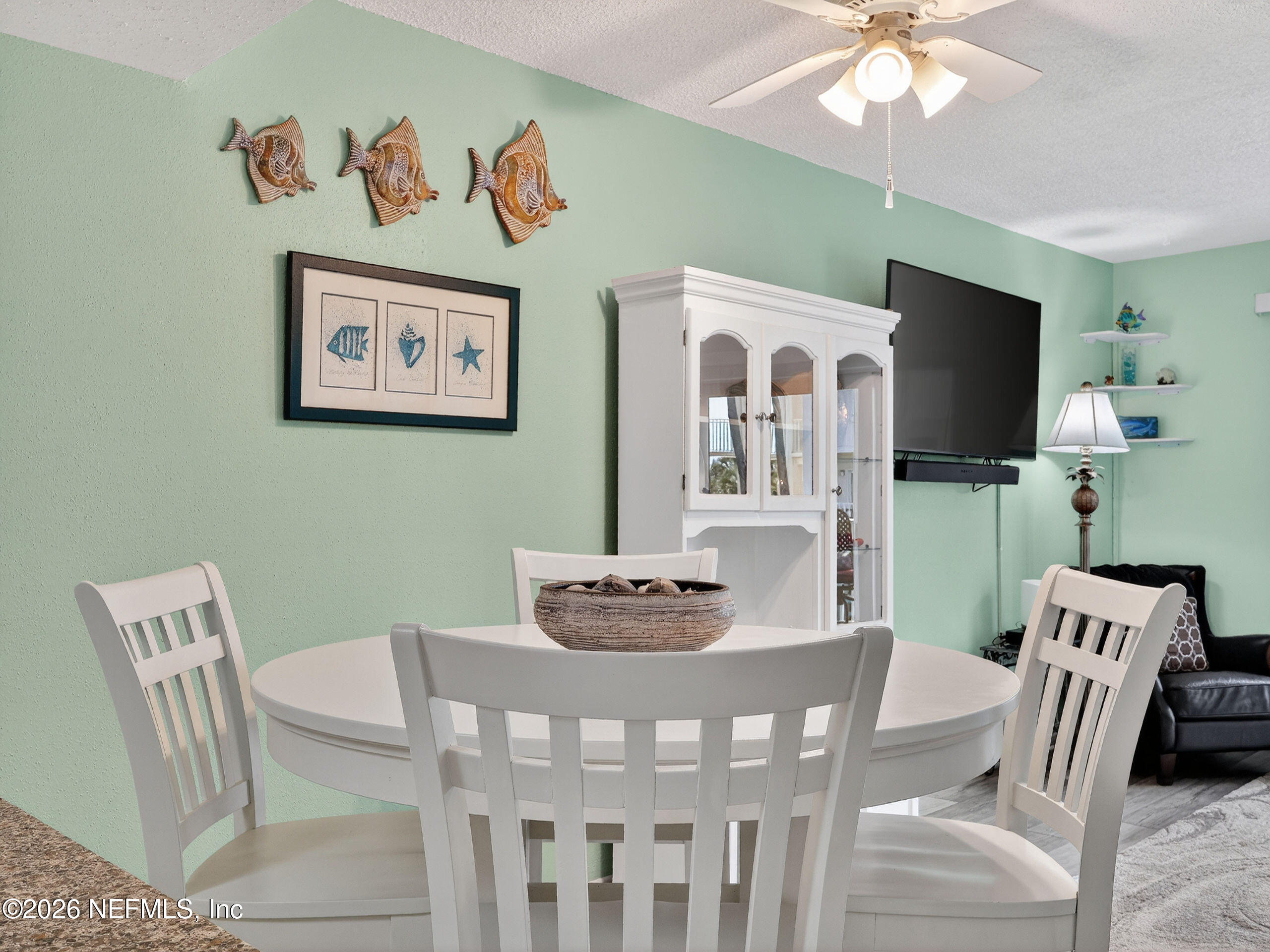 1 Ocean Trace Road, Unit 230 St. Augustine Beach, FL 32080 - Photo 10 of 50 a view of a dining room with furniture