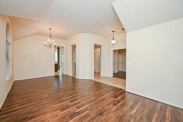 a view of a livingroom with wooden floor