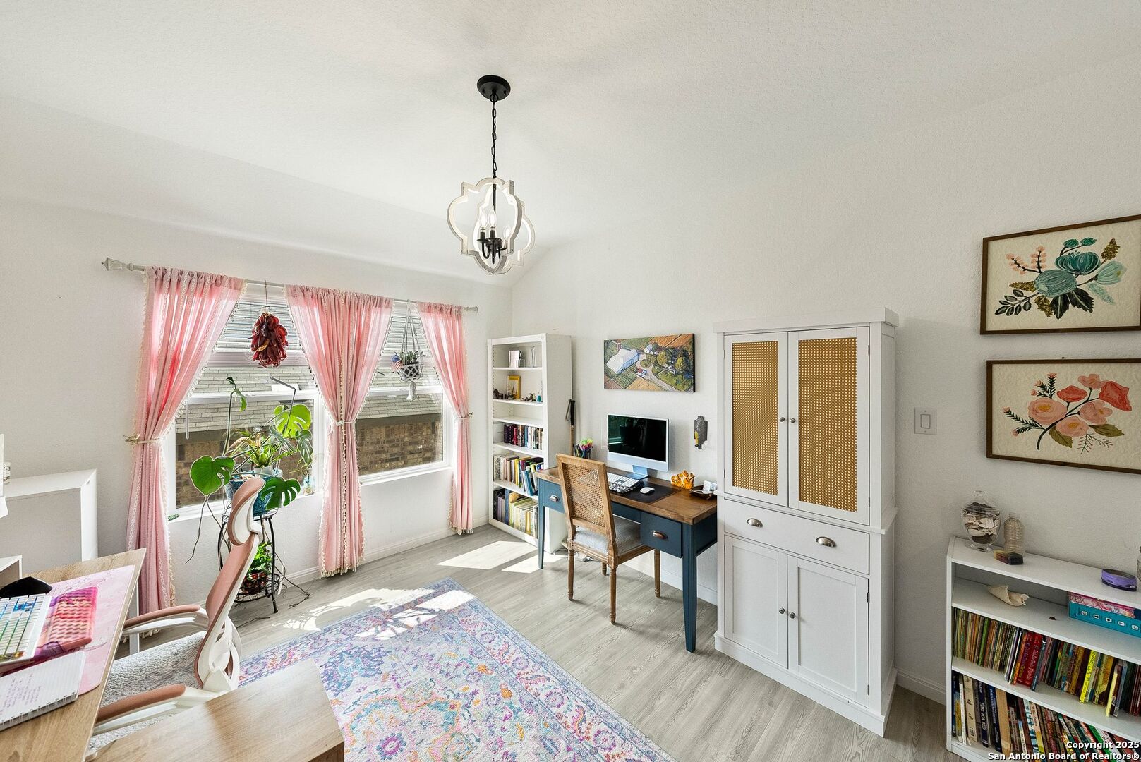 5483 Jasmine Bulverde, TX 78163 - Photo 13 of 71 a view of a livingroom with furniture workspace and a window