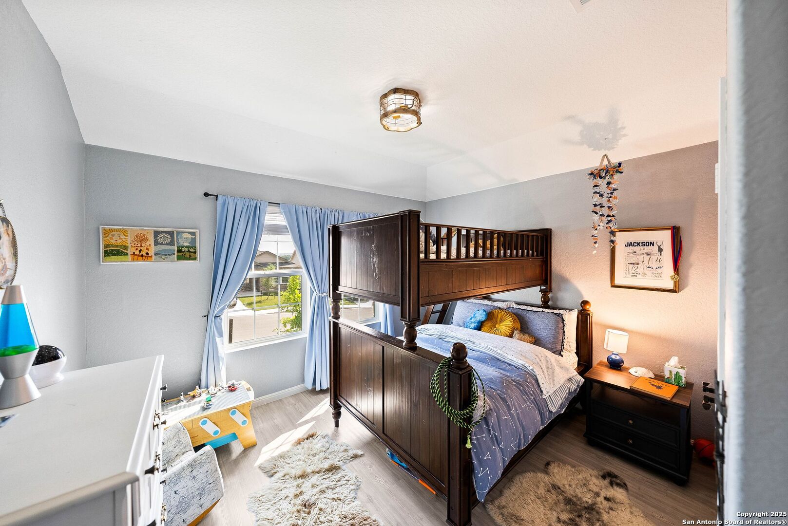 5483 Jasmine Bulverde, TX 78163 - Photo 17 of 71 a bed room with a bed and a window