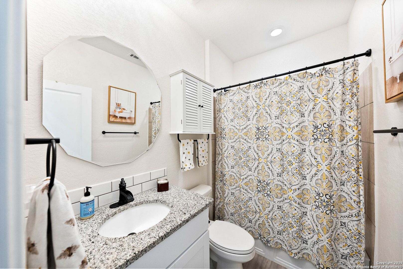 5483 Jasmine Bulverde, TX 78163 - Photo 24 of 71 a bathroom with a granite countertop sink toilet and shower