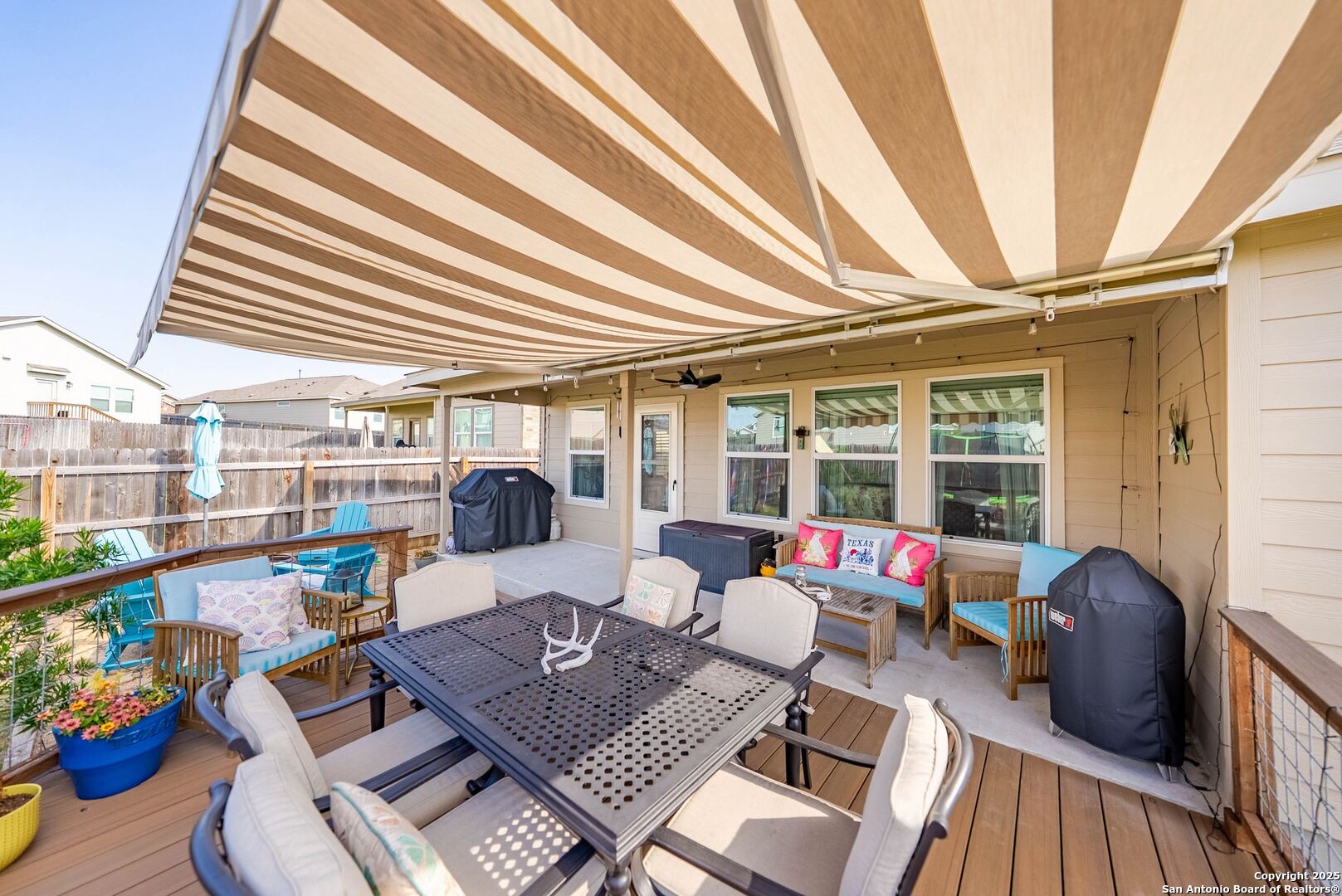 5483 Jasmine Bulverde, TX 78163 - Photo 35 of 71 a living room with furniture and a floor to ceiling window