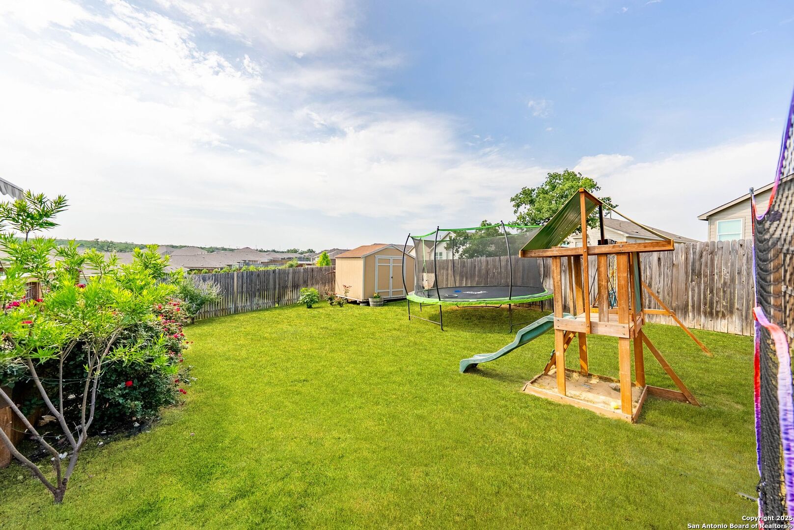 5483 Jasmine Bulverde, TX 78163 - Photo 38 of 71 a view of a house with a swimming pool and a yard