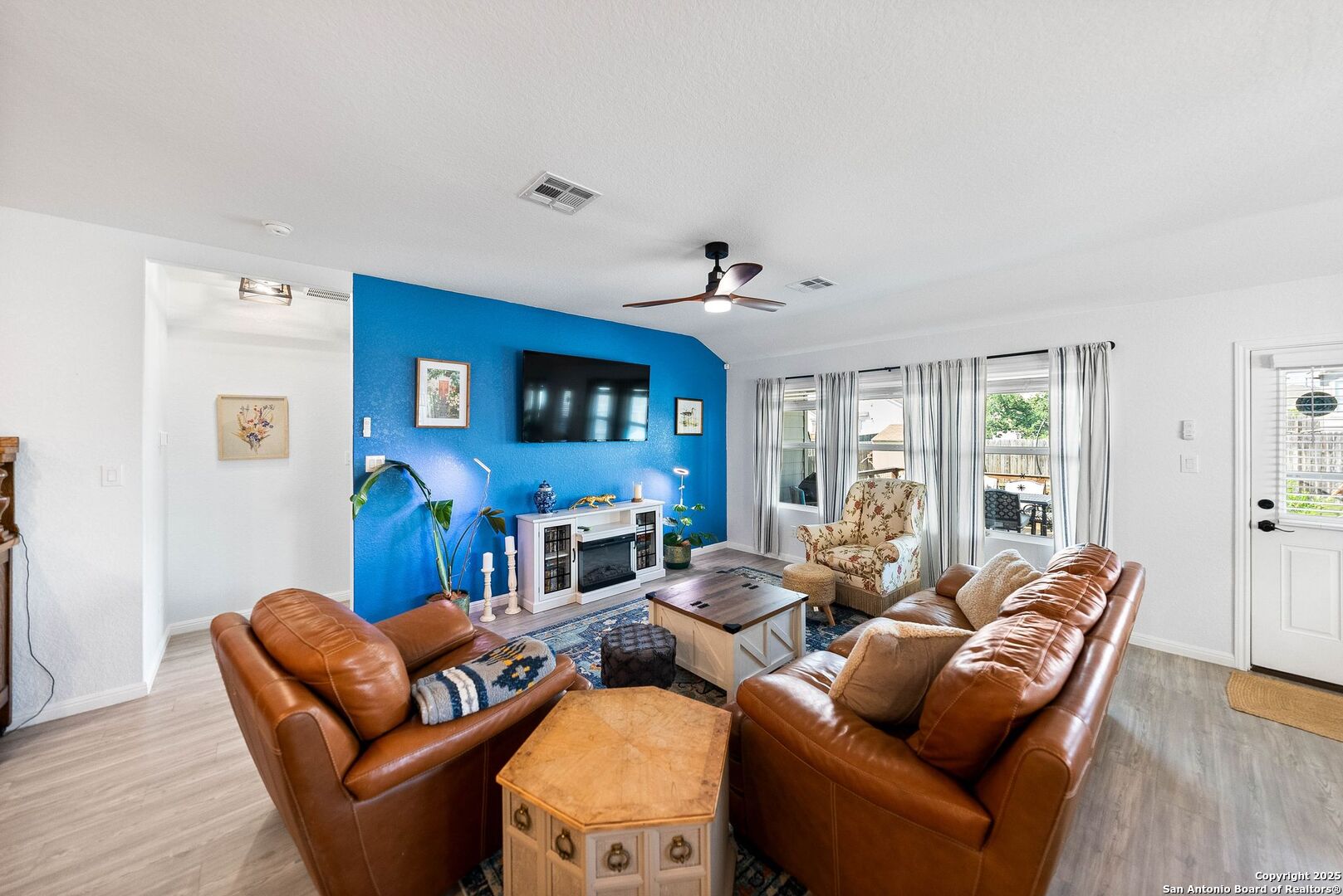 5483 Jasmine Bulverde, TX 78163 - Photo 4 of 71 a living room with furniture and a flat screen tv
