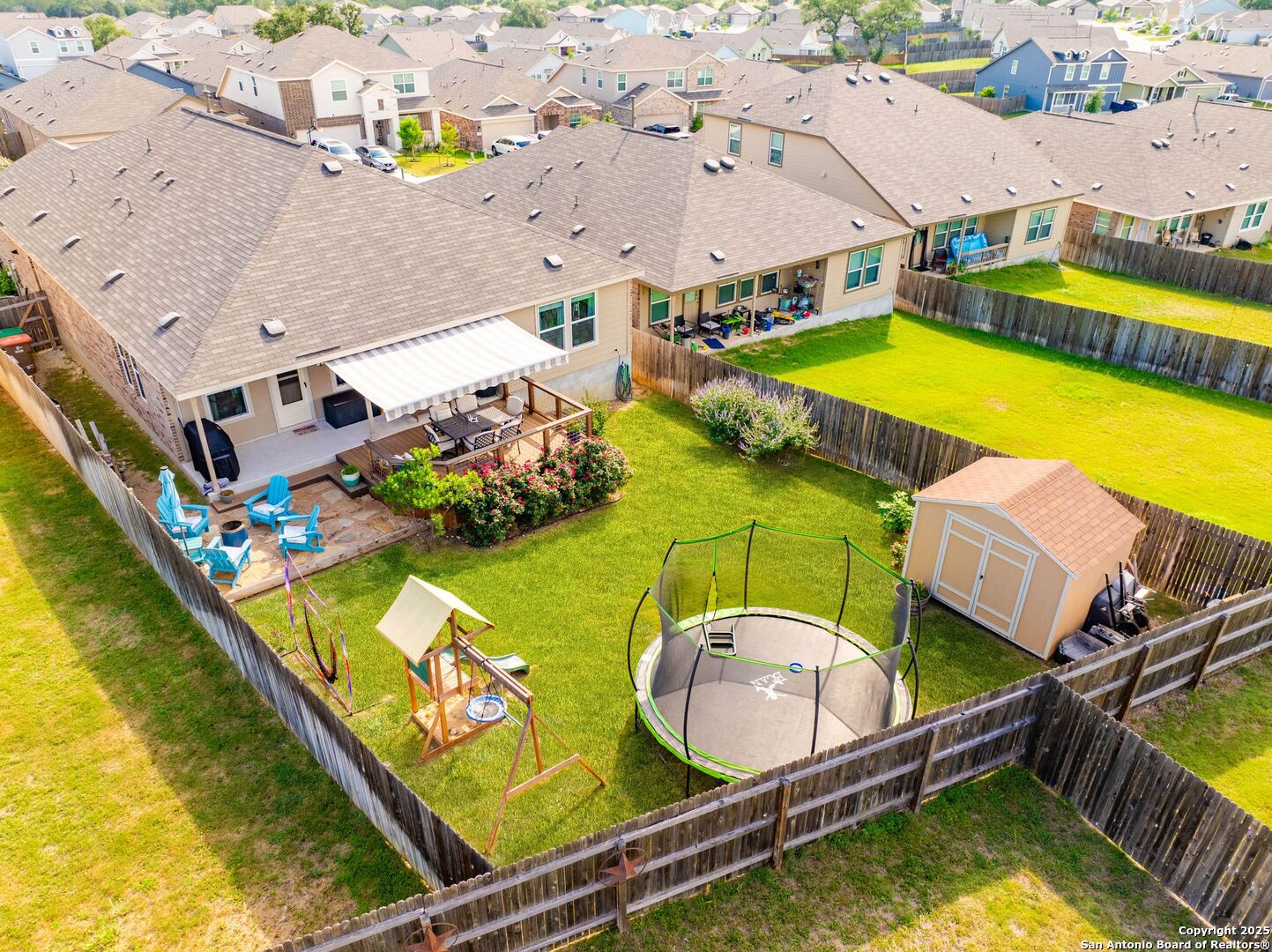 5483 Jasmine Bulverde, TX 78163 - Photo 42 of 71 an aerial view of a house with a swimming pool