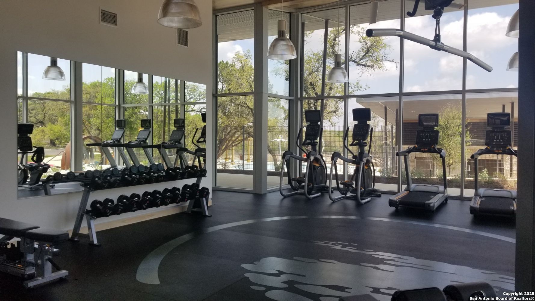 5483 Jasmine Bulverde, TX 78163 - Photo 58 of 71 a living room with large glass windows and furniture