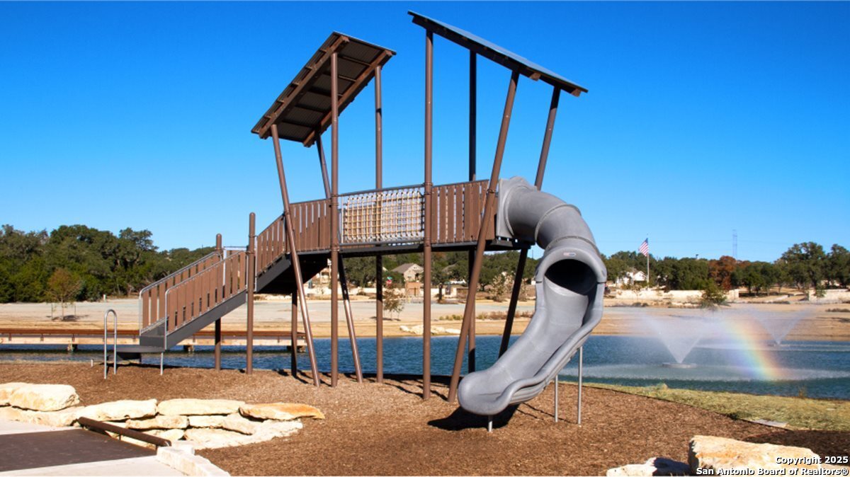 5483 Jasmine Bulverde, TX 78163 - Photo 69 of 71 a backyard of a house with table and chairs