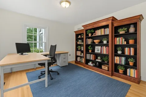 a workspace with a bookshelf