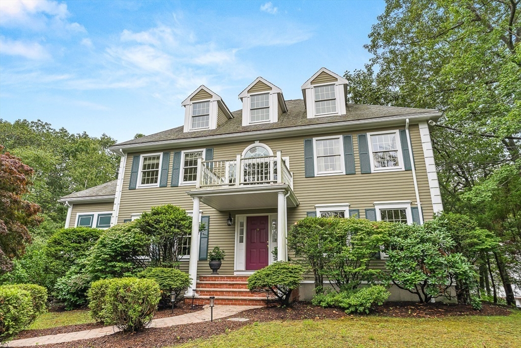 276 High Street Winchester, MA 01890 - Photo 2 of 38 a front view of a house with garden