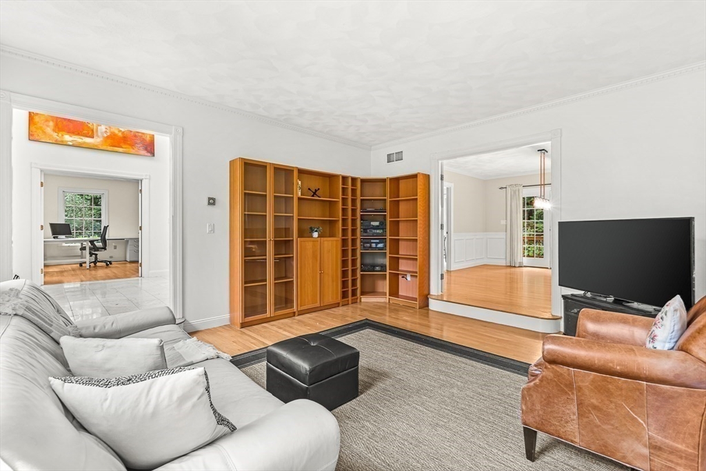 276 High Street Winchester, MA 01890 - Photo 21 of 38 a living room with furniture and a flat screen tv