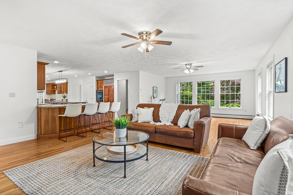 276 High Street Winchester, MA 01890 - Photo 6 of 38 a living room with furniture and a large window