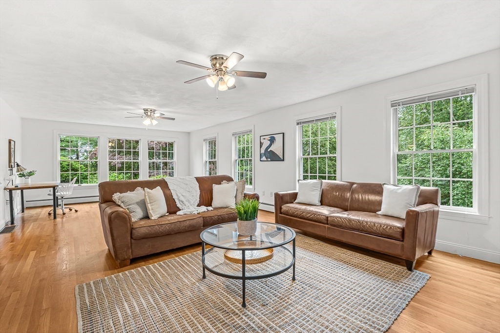 276 High Street Winchester, MA 01890 - Photo 7 of 38 a living room with furniture and a large window