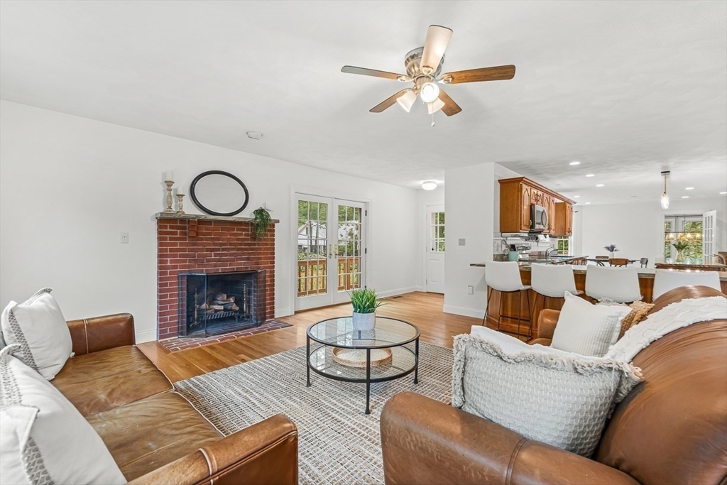276 High Street Winchester, MA 01890 - Photo 9 of 38 a living room with furniture and a fireplace
