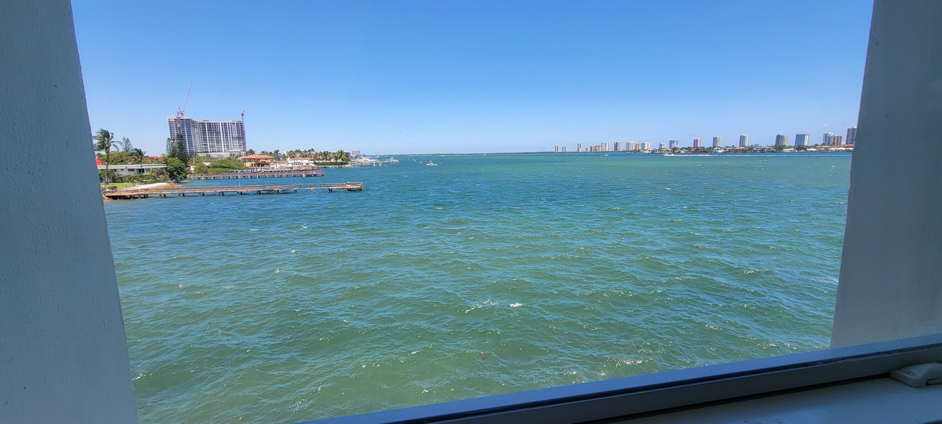 410 Wilma Circle, Unit 308 Riviera Beach, FL 33404 - Photo 1 of 27 a view of a balcony with city view