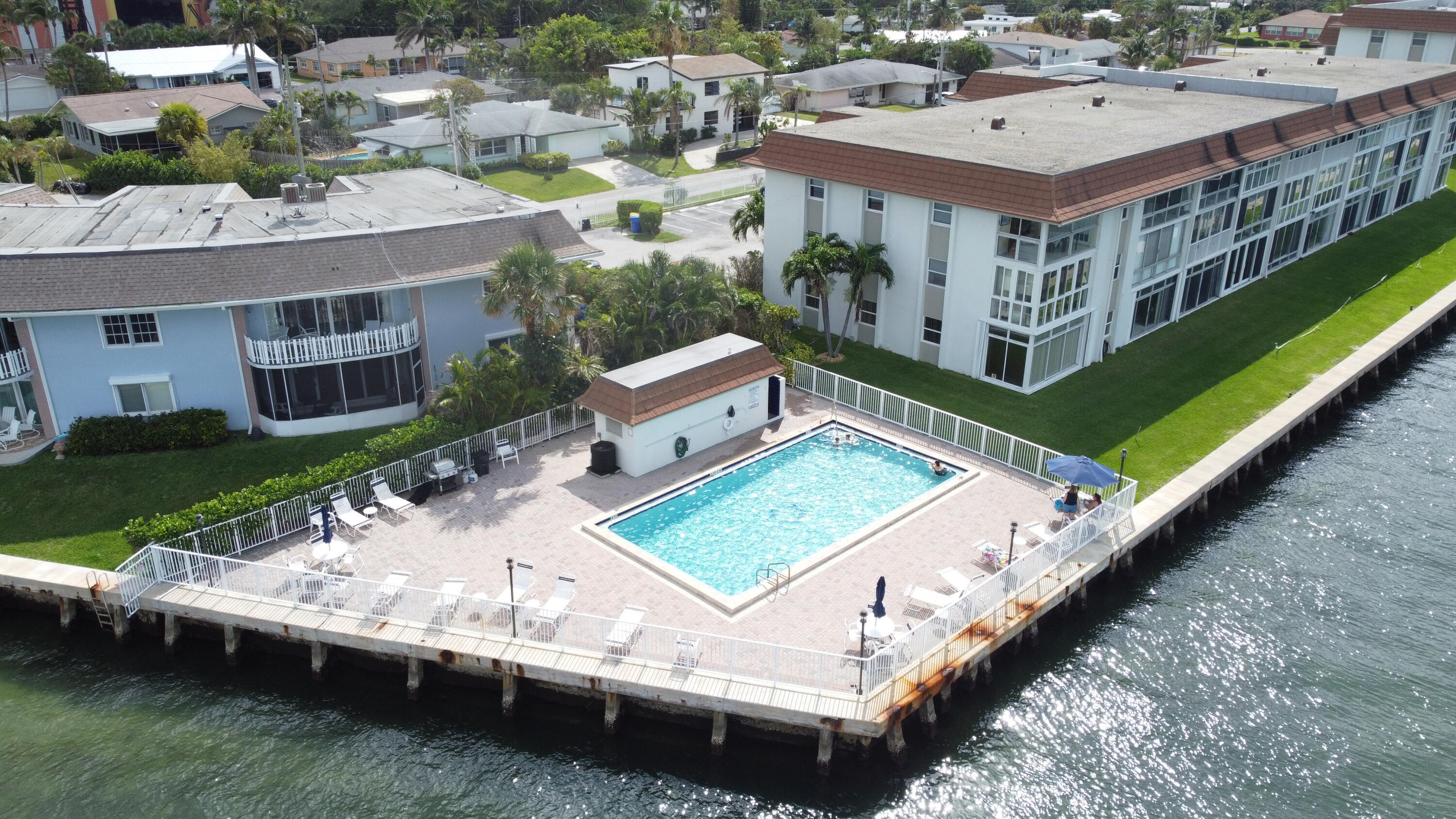 410 Wilma Circle, Unit 308 Riviera Beach, FL 33404 - Photo 13 of 27 a view of a house with roof deck