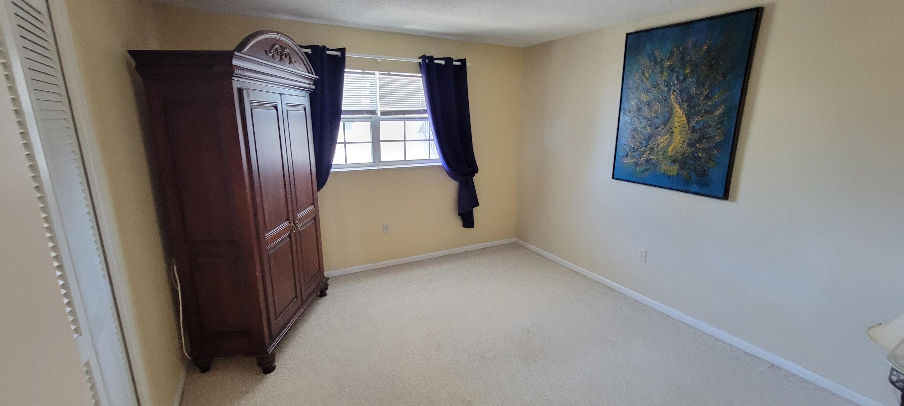 410 Wilma Circle, Unit 308 Riviera Beach, FL 33404 - Photo 26 of 27 a view of entryway with window