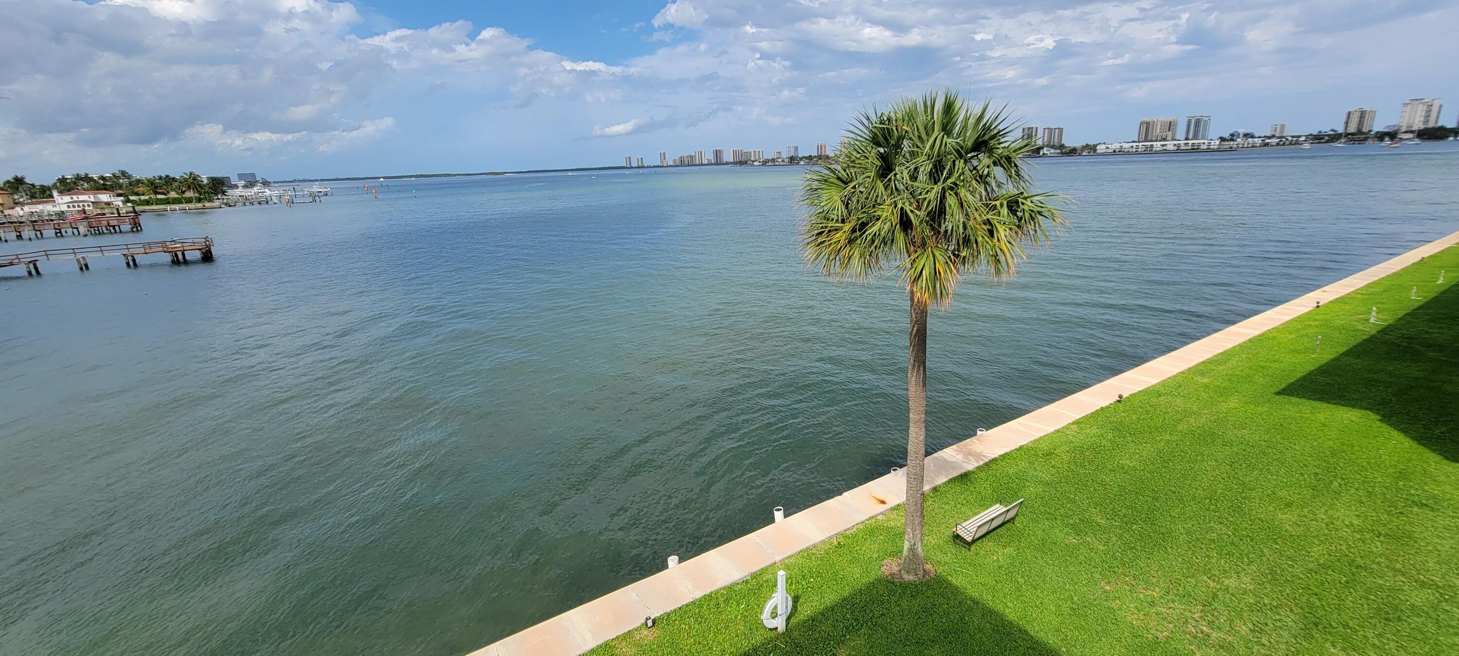 410 Wilma Circle, Unit 308 Riviera Beach, FL 33404 - Photo 3 of 27 a view of a lake from a balcony