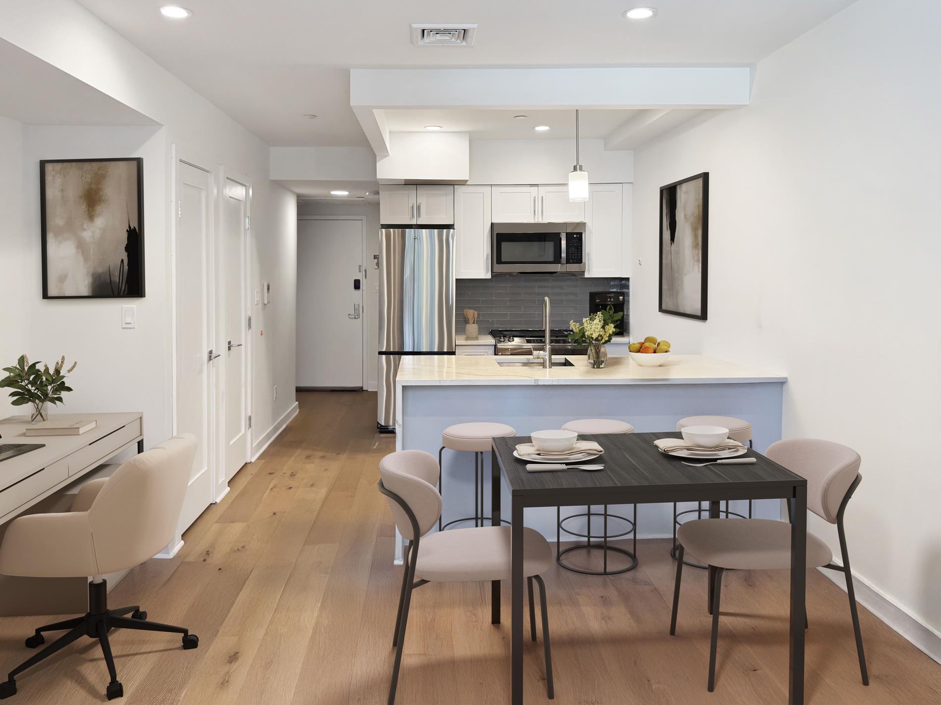 31-22 29th Street, Unit 2B Queens, NY 11106 - Photo 2 of 11 a view of a dining room with furniture and wooden floor