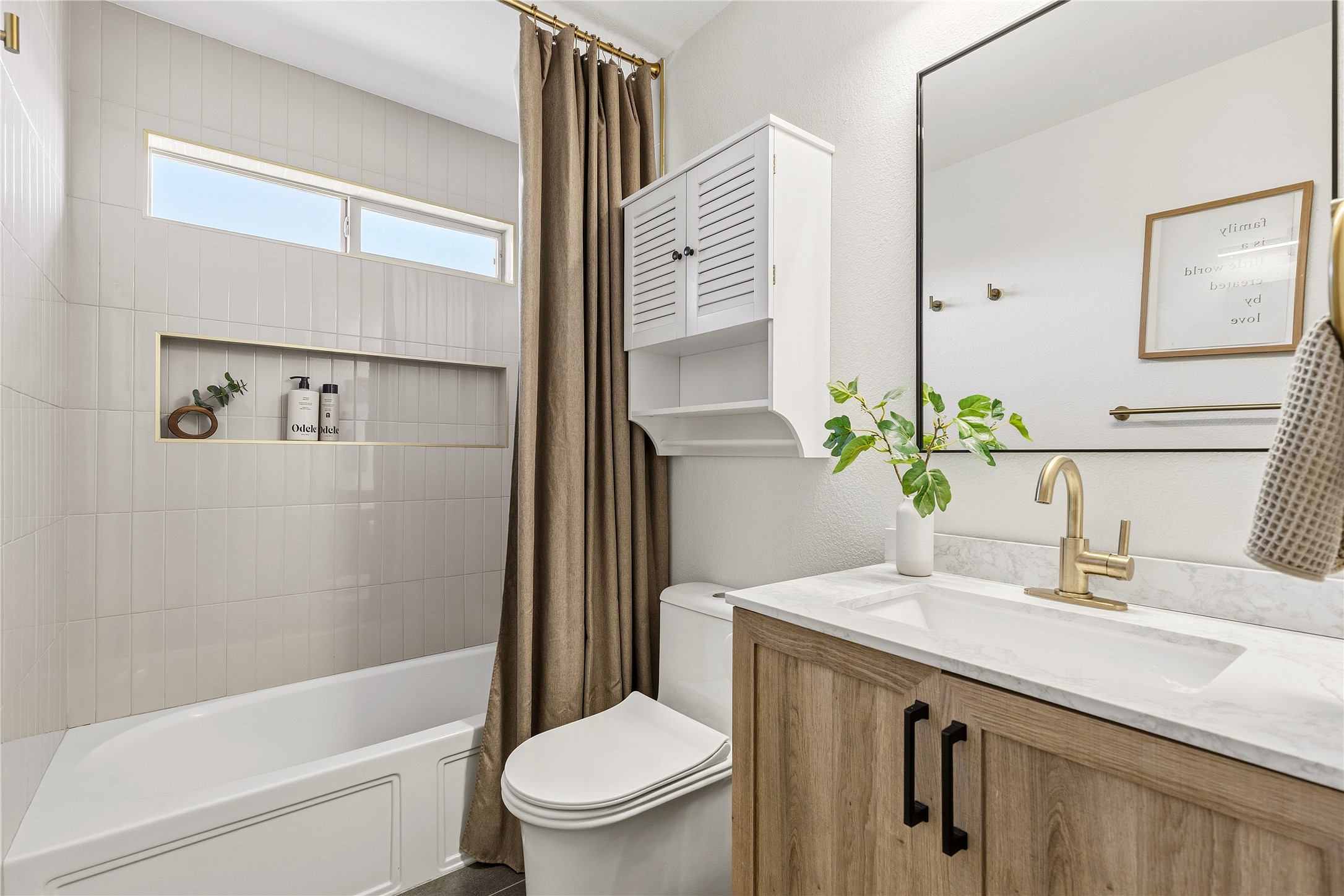 7400 South Glenn Street Austin, TX 78744 - Photo 18 of 36 Full bathroom with vanity and shower / bath combo with shower curtain