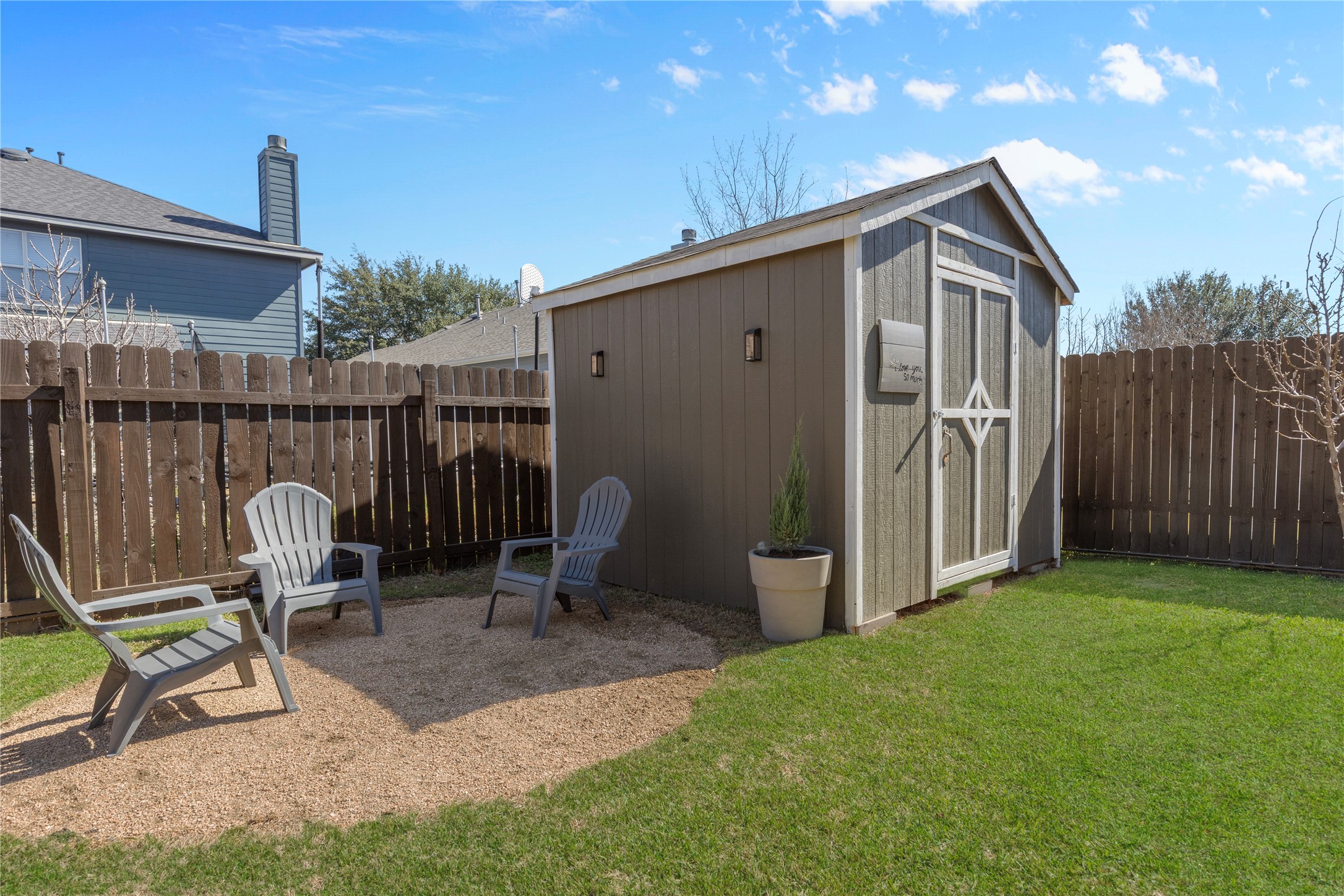7400 South Glenn Street Austin, TX 78744 - Photo 27 of 36 View of shed with a fenced backyard