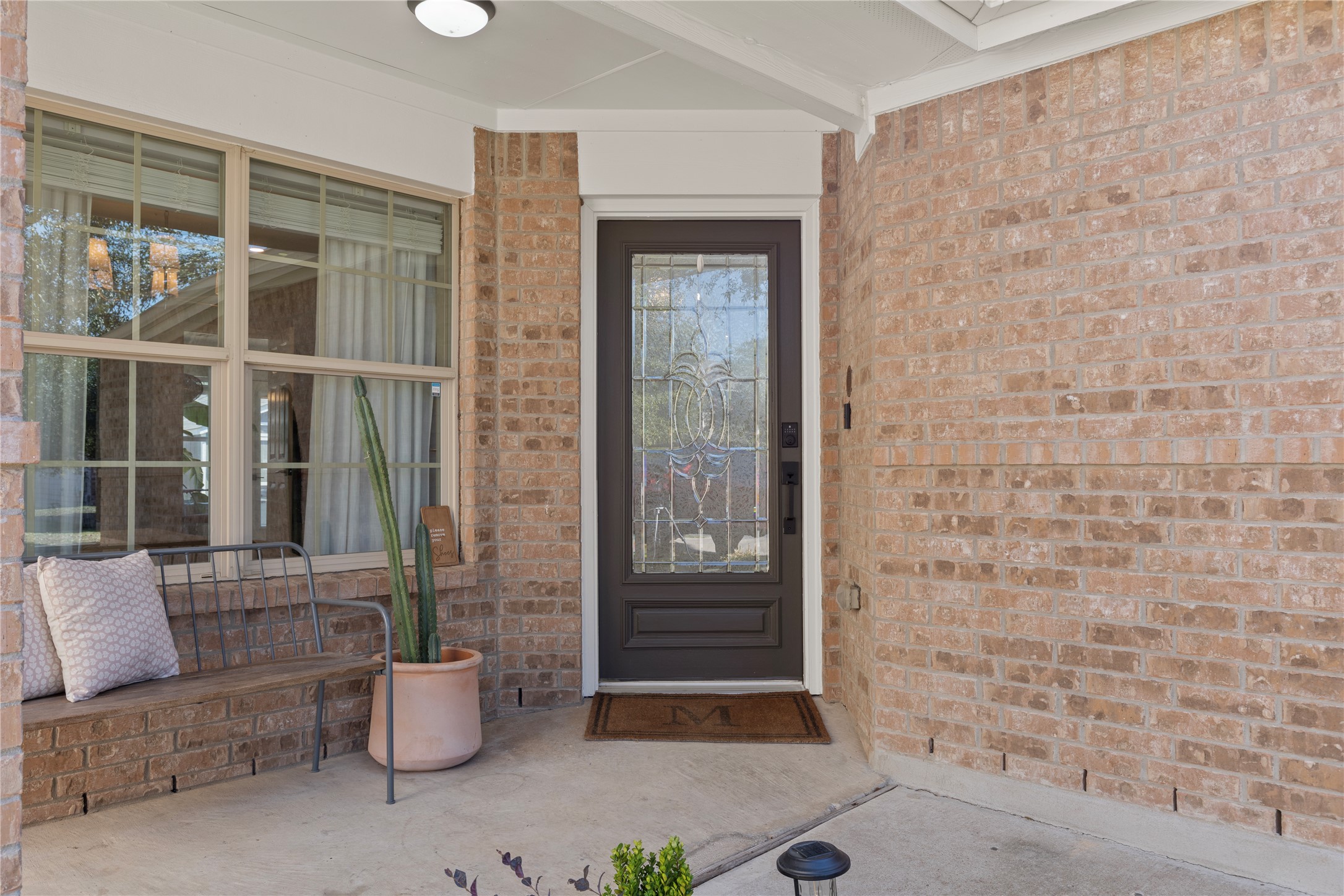 7400 South Glenn Street Austin, TX 78744 - Photo 3 of 36 Property entrance featuring brick siding