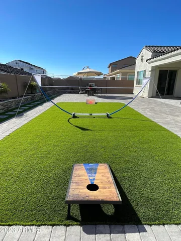 a view of a back yard of the house