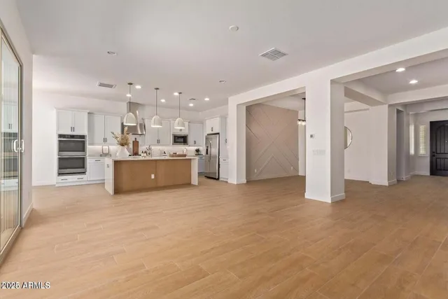 a view of a kitchen with a sink