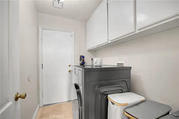 a bedroom with a bed and a fireplace