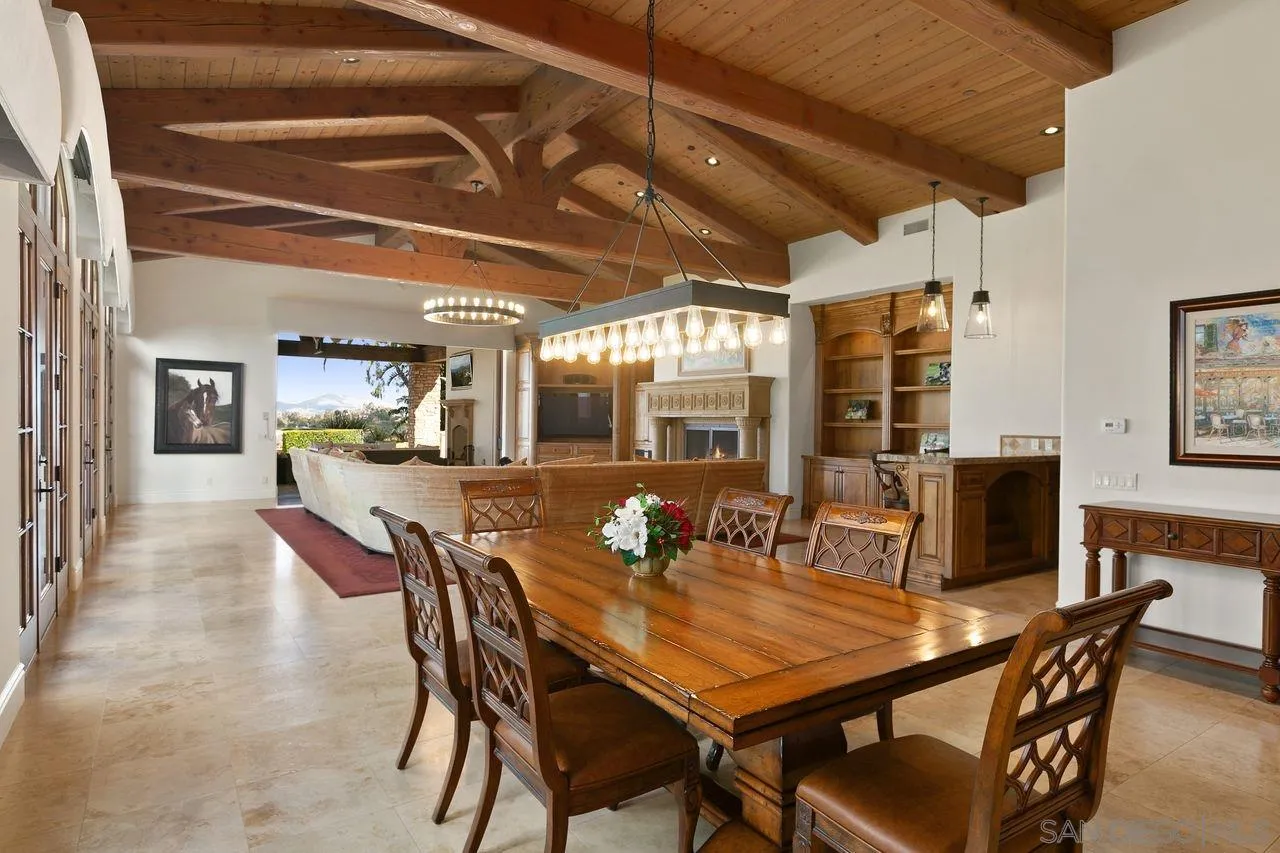 6658 Niemann Ranch Road Rancho Santa Fe, CA 92067 - Photo 15 of 35 a dining room with furniture and window