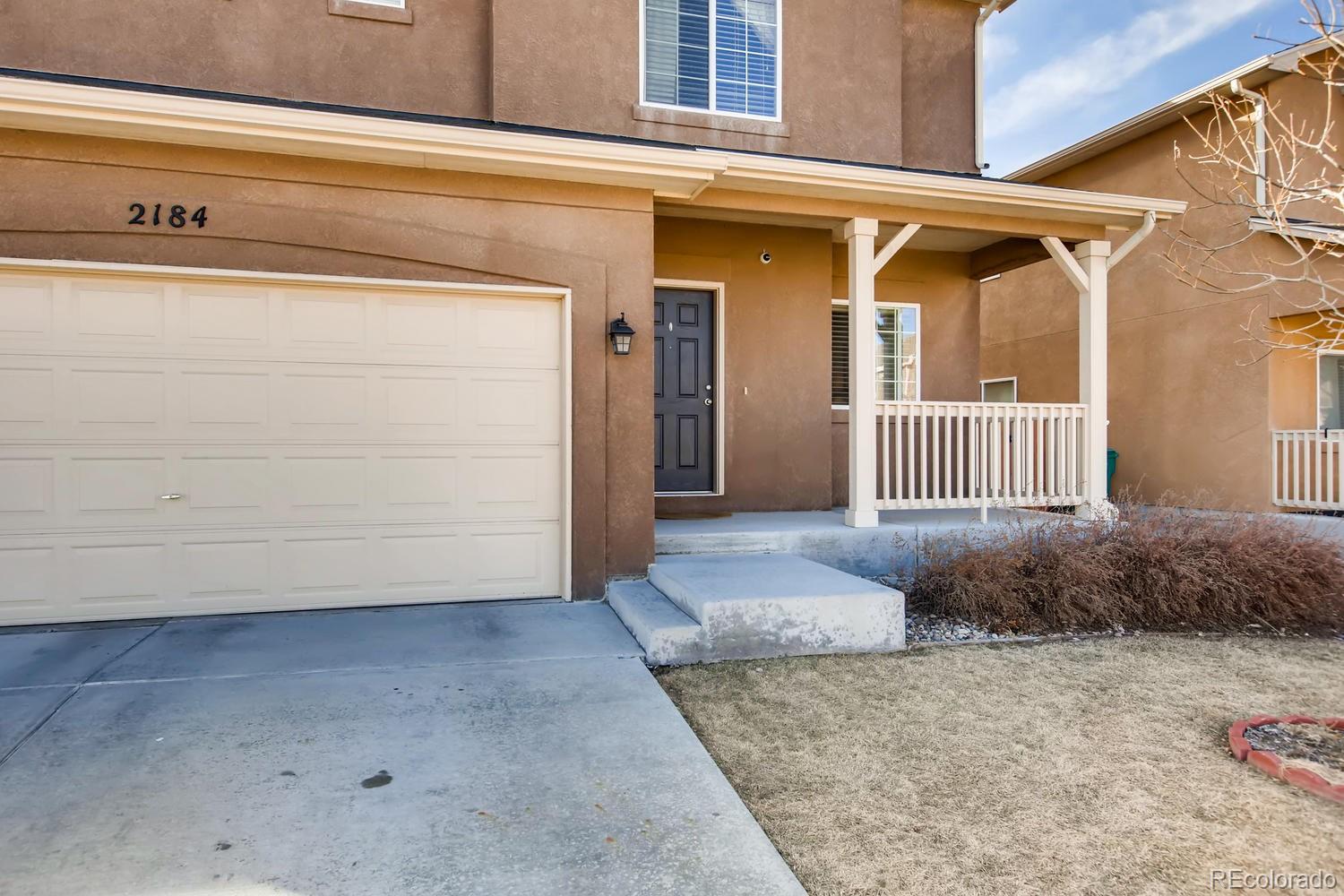 2184 Reed Grass Way Colorado Springs, CO 80915 - Photo 29 of 29 a view of a house with backyard