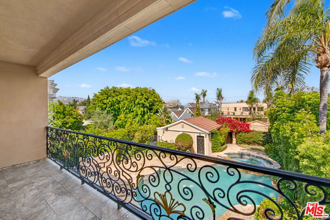 204 Foothill Road Beverly Hills, CA 90210 - Photo 27 of 38 a view of a street with an outdoor space