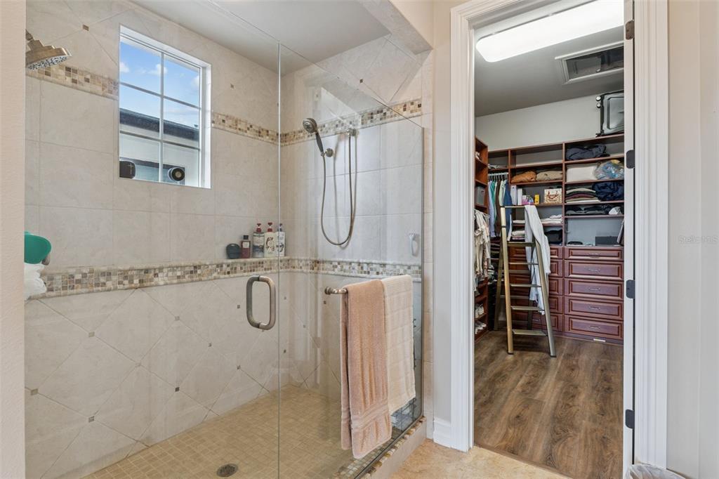 1172 Castle Pines Court Reunion, FL 34747 - Photo 36 of 65 a bathroom with a shower