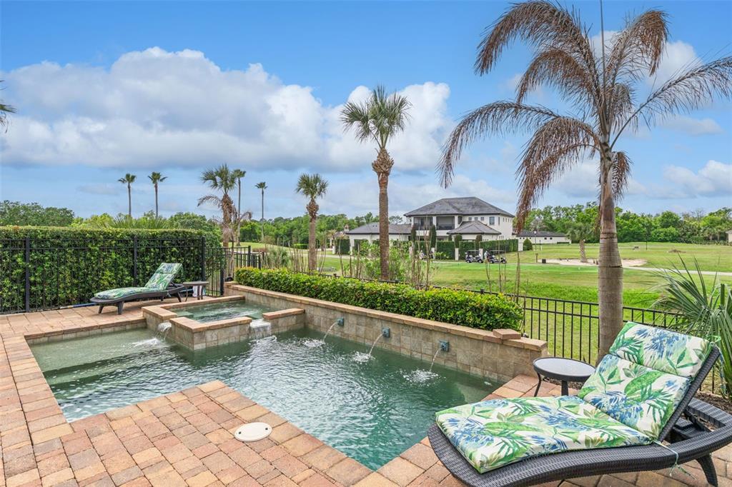1172 Castle Pines Court Reunion, FL 34747 - Photo 44 of 65 a view of a garden with houses