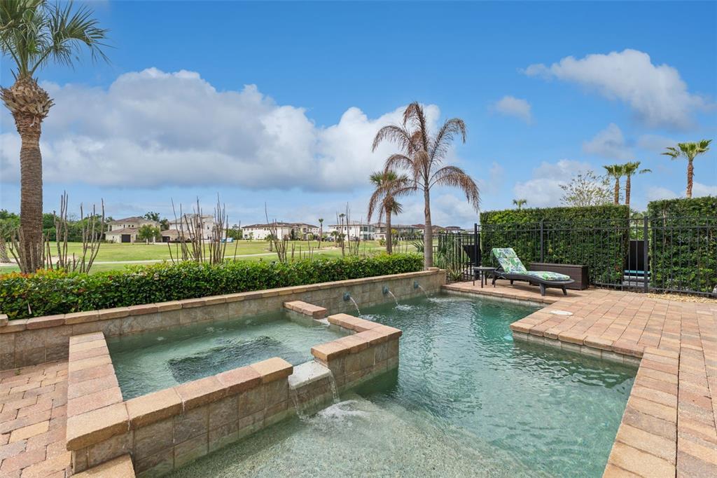 1172 Castle Pines Court Reunion, FL 34747 - Photo 45 of 65 a view of swimming pool with outdoor seating and city view